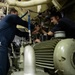 USS Sioux City Sailors Conduct Maintenance on Machinery While in Port