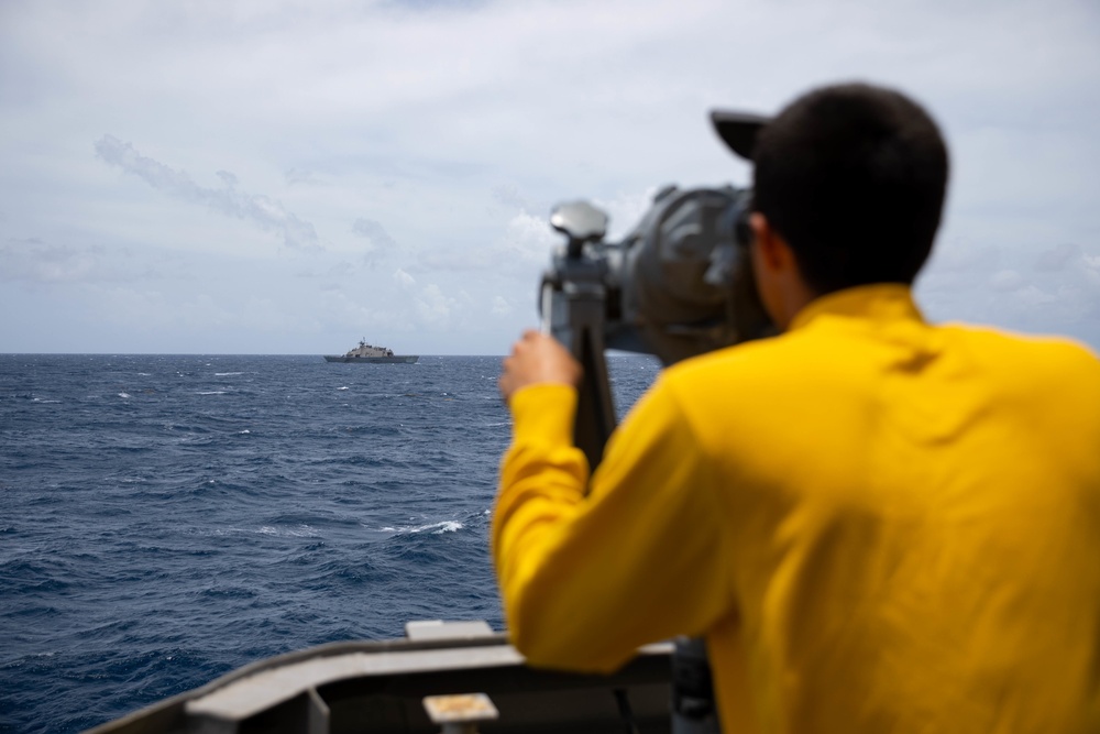 USS Sioux City Sailor Stands Lookout as the Ship Conducts Operations with USS Wichita