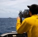 USS Sioux City Sailor Stands Lookout as the Ship Conducts Operations with USS Wichita