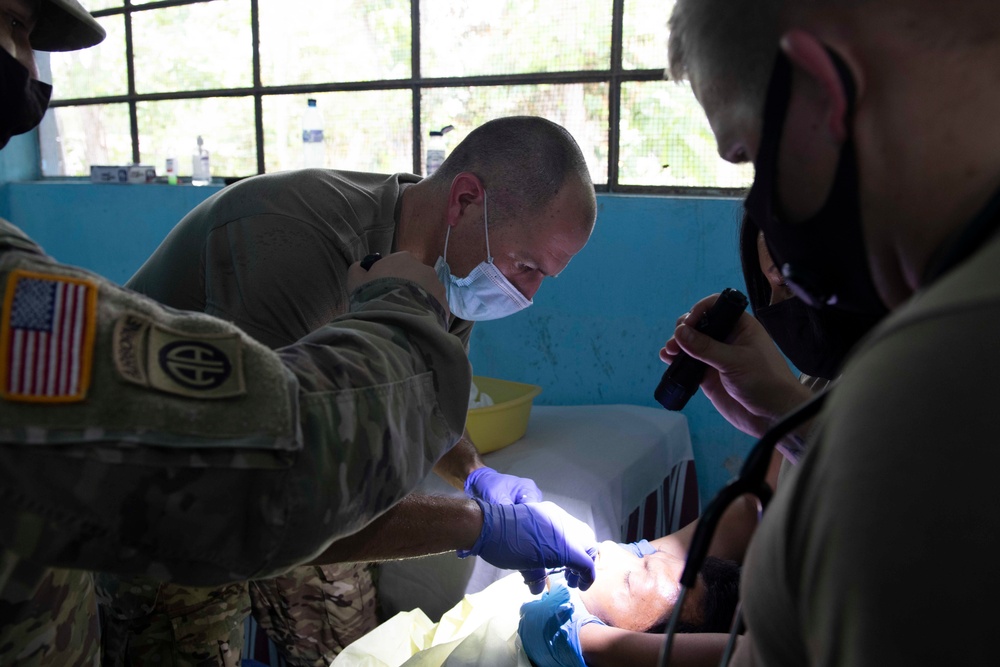 U.S. military medical professionals provide emergency care during RS-21