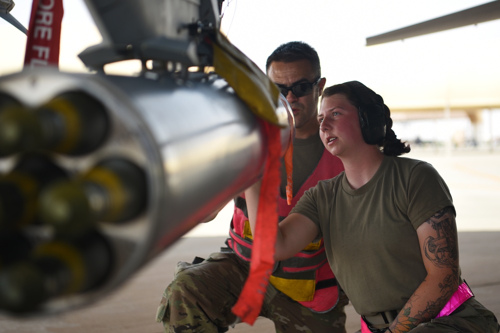 157th Airmen recover an aircraft after a mission