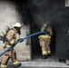 Firefighters conduct live fire training