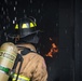 Firefighters conduct live fire training