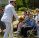 Cdr. Bunch gives mother flowers