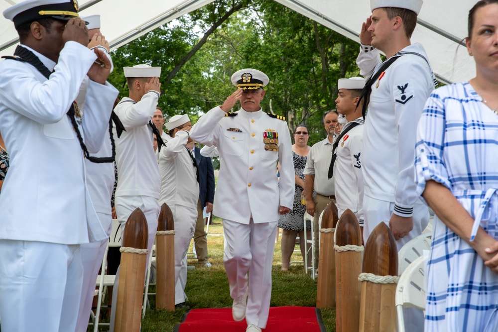 Cdr. Bunch saluting