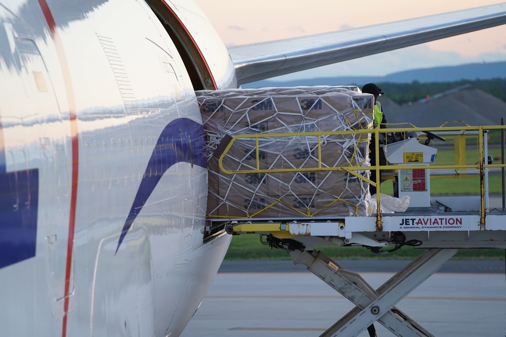 Supplies the U.S. government, through the U.S. Agency for International Development, donated to India, are transported onto a waiting National Airlines plane on April 30, 2021. (USAID photo by Patrick Moore)