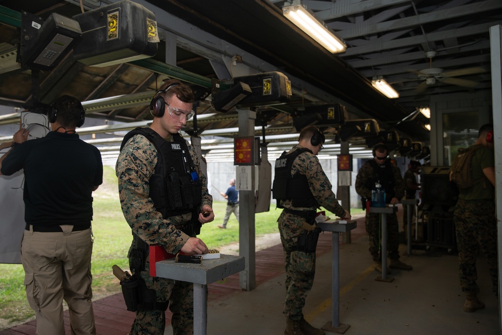 Military Police Officers conduct pistol qualifications