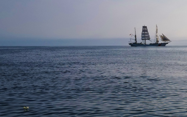 USCGC Eagle (WIX 327) conducts wreath-laying for USCGC Hamilton (WPG 34) off Iceland