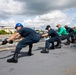USS Sioux City and HSC 22 Sailors Handle Lines as the Ship Moors Into Port at Naval Station Guantanamo Bay, Cuba