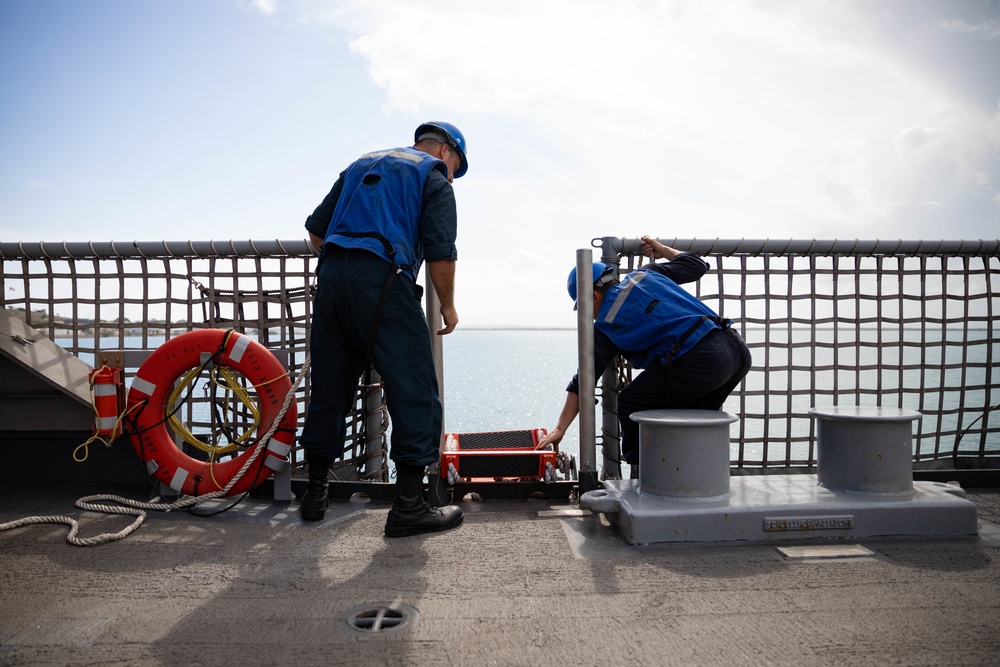 USS Sioux City Sailors Lower the Pilot’s Ladder as the ship Departs Naval Station Guantanamo Bay, Cuba