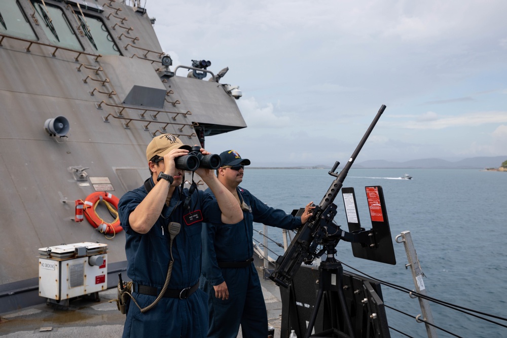 USS Sioux City Sailors Man a .50-Caliber Machine Gun During Sea and Anchor Detail