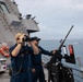 USS Sioux City Sailors Man a .50-Caliber Machine Gun During Sea and Anchor Detail