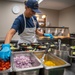 Petty Officer 3rd Class Priscilla Gomez prepares lunch for Station Golden Gate crew