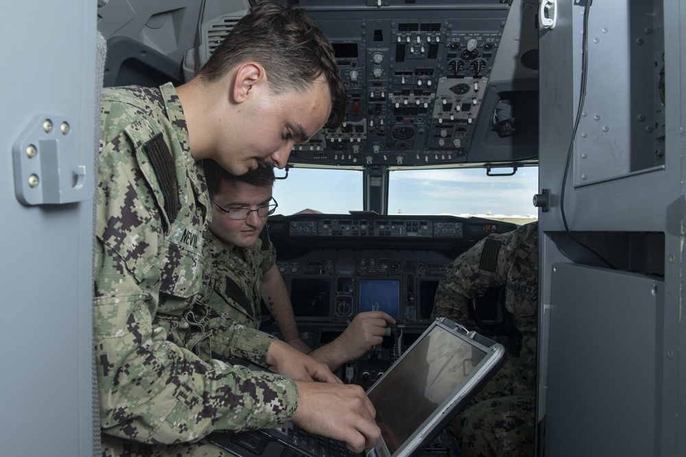 VR-57 Sailors Conduct Maintenance