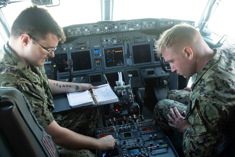 VR-57 Sailors Conduct Maintenance