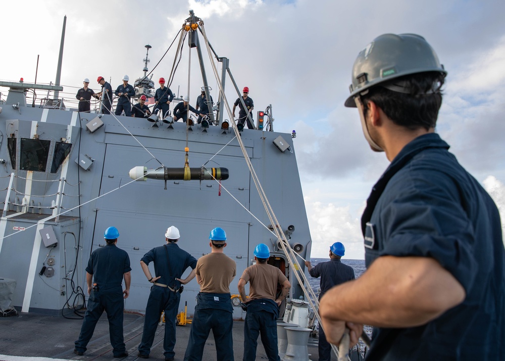 USS Michael Murphy Sailors Onload a Torpedo