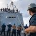 USS Michael Murphy Sailors Onload a Torpedo