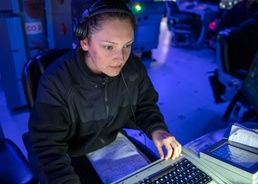 Operations Specialist Seaman Apprentice Abigail Dalton, from Dayton, Ohio, tracks surface contacts