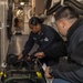 USS O’Kane Sailors perform maintenance on stretcher bearer
