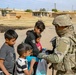 Local children react to U.S Military presence