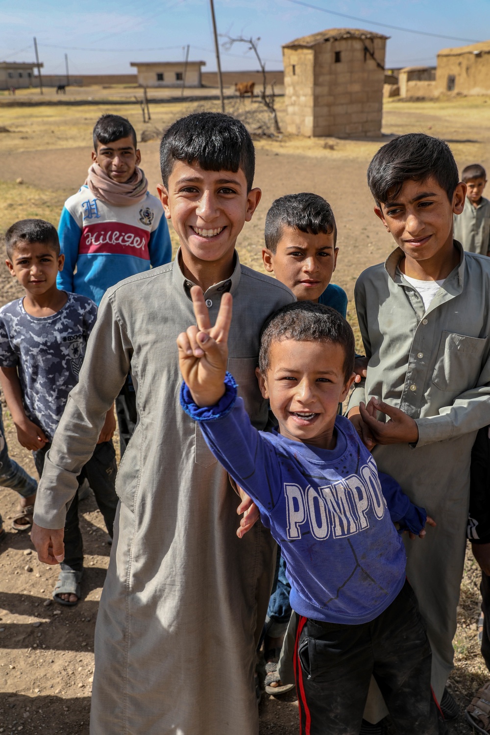 Local children react to U.S Military presence