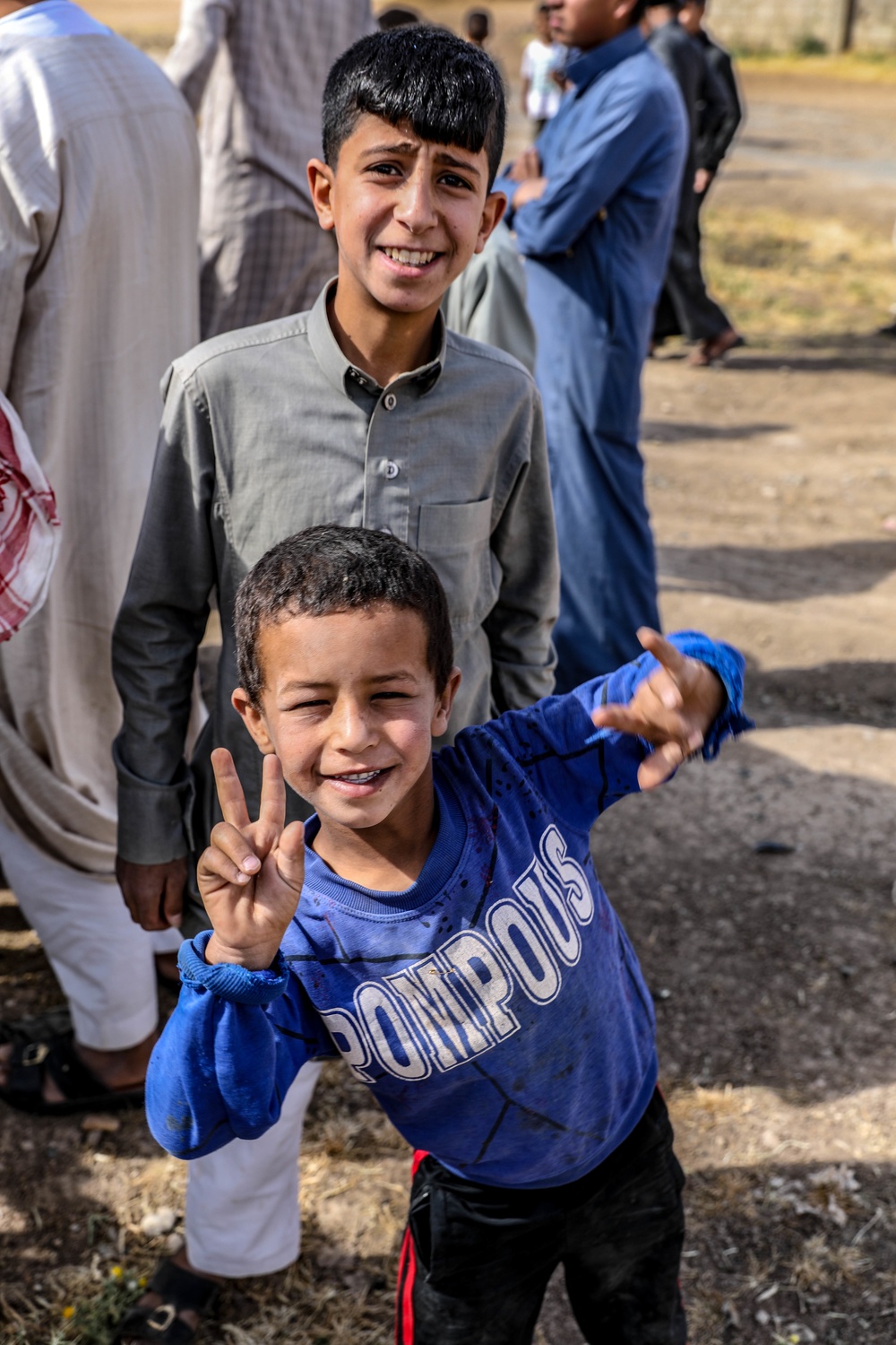 Local children react to U.S Military presence