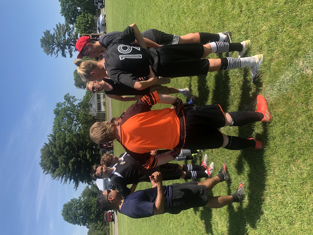 HHC Soldiers share love of soccer with Tomah youth