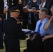 Brig. Gen. Osborn presents a U.S. flag to the family of Cpl. Eldert J. Beek