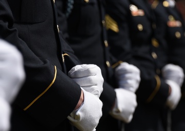 Honor Guard hands on rifles