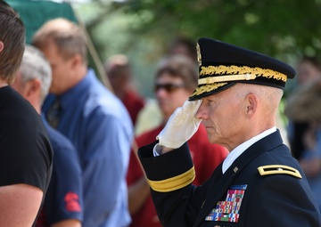 Brig. Gen. Stephen Osborn salutes Cpl. Eldert J. Beek