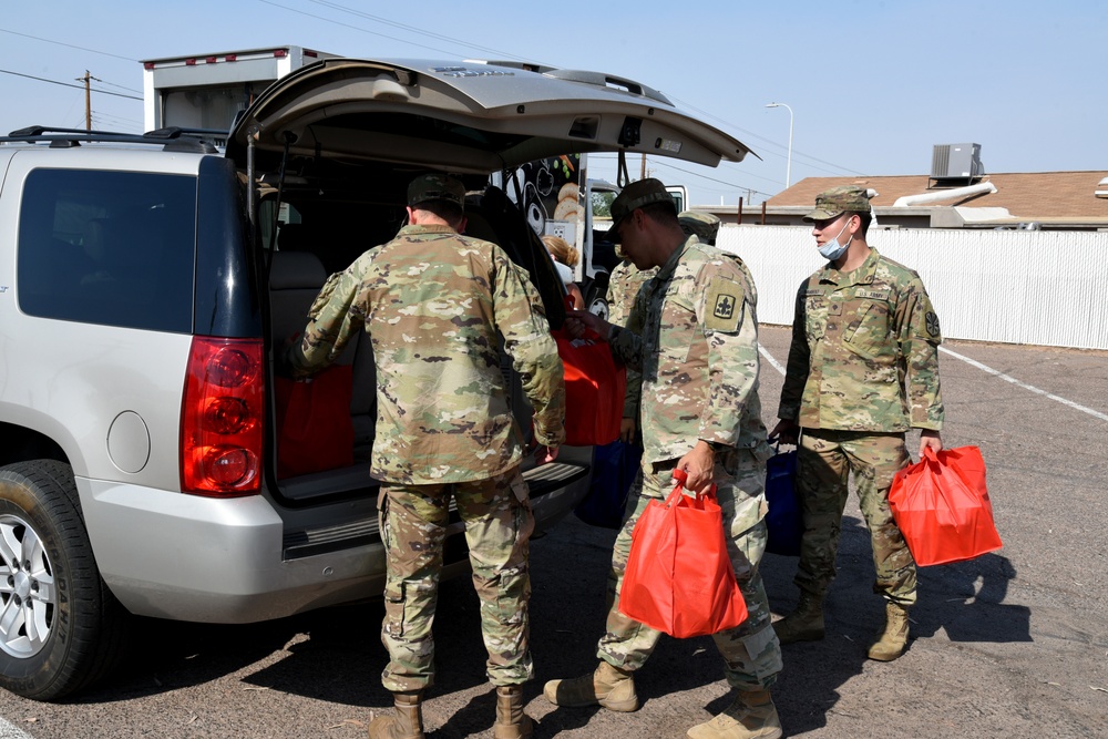 AZNG assists at drive-in and walk-up food food bank