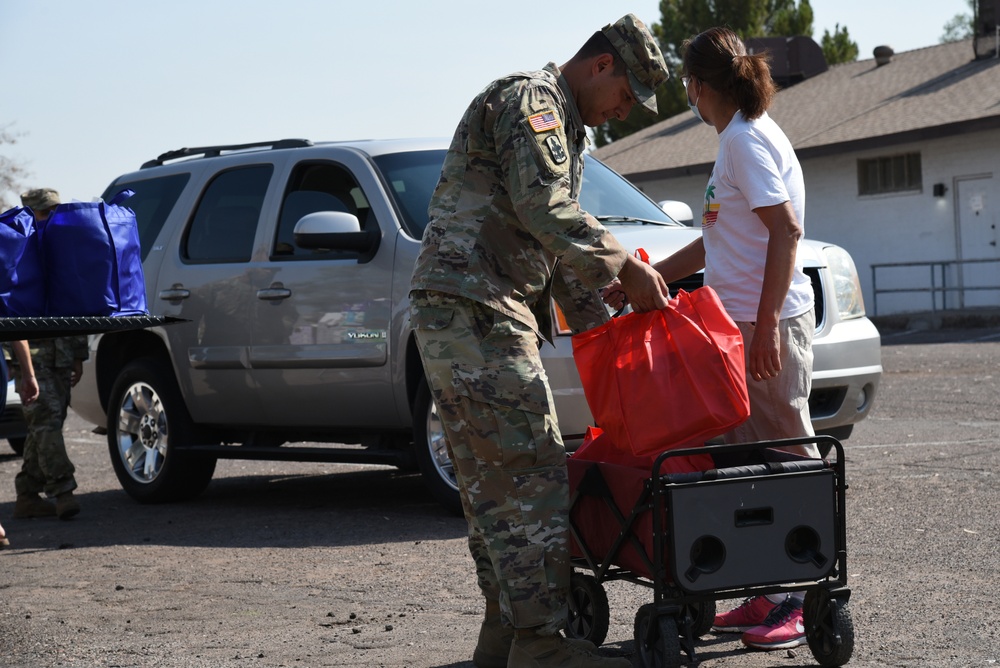 AZNG assists at drive-in and walk-up food food bank