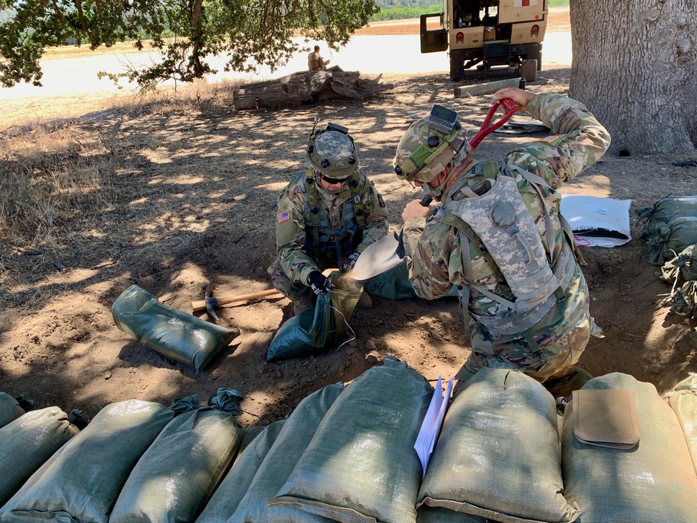 Army Reserve medical Soldiers improve their fighting position at Schoonover Airfield