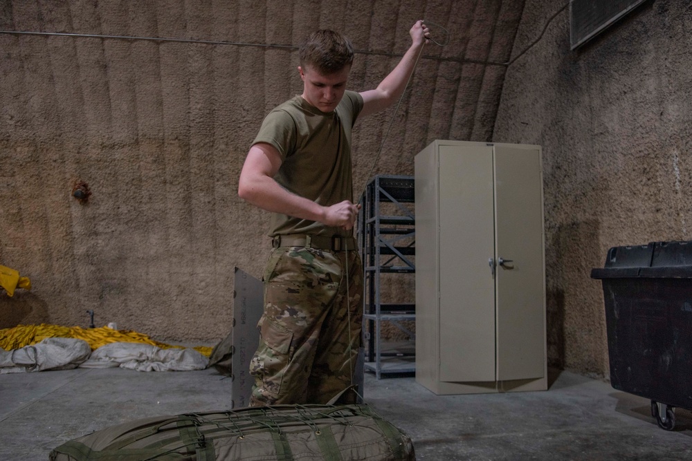 You deploy it, we pack it; 23rd EBS parachute shop