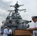 Two Sailors and one Soldier become new citizens of the U.S. during a naturalization ceremony aboard USS Milius stationed at CFAY