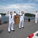 Two Sailors and one Soldier become new citizens of the U.S. during a naturalization ceremony aboard USS Milius stationed at CFAY