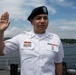 Two Sailors and one Soldier become new citizens of the U.S. during a naturalization ceremony aboard USS Milius stationed at CFAY