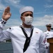 Two Sailors and one Soldier become new citizens of the U.S. during a naturalization ceremony aboard USS Milius stationed at CFAY