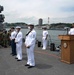 Two Sailors and one Soldier become new citizens of the U.S. during a naturalization ceremony aboard USS Milius stationed at CFAY