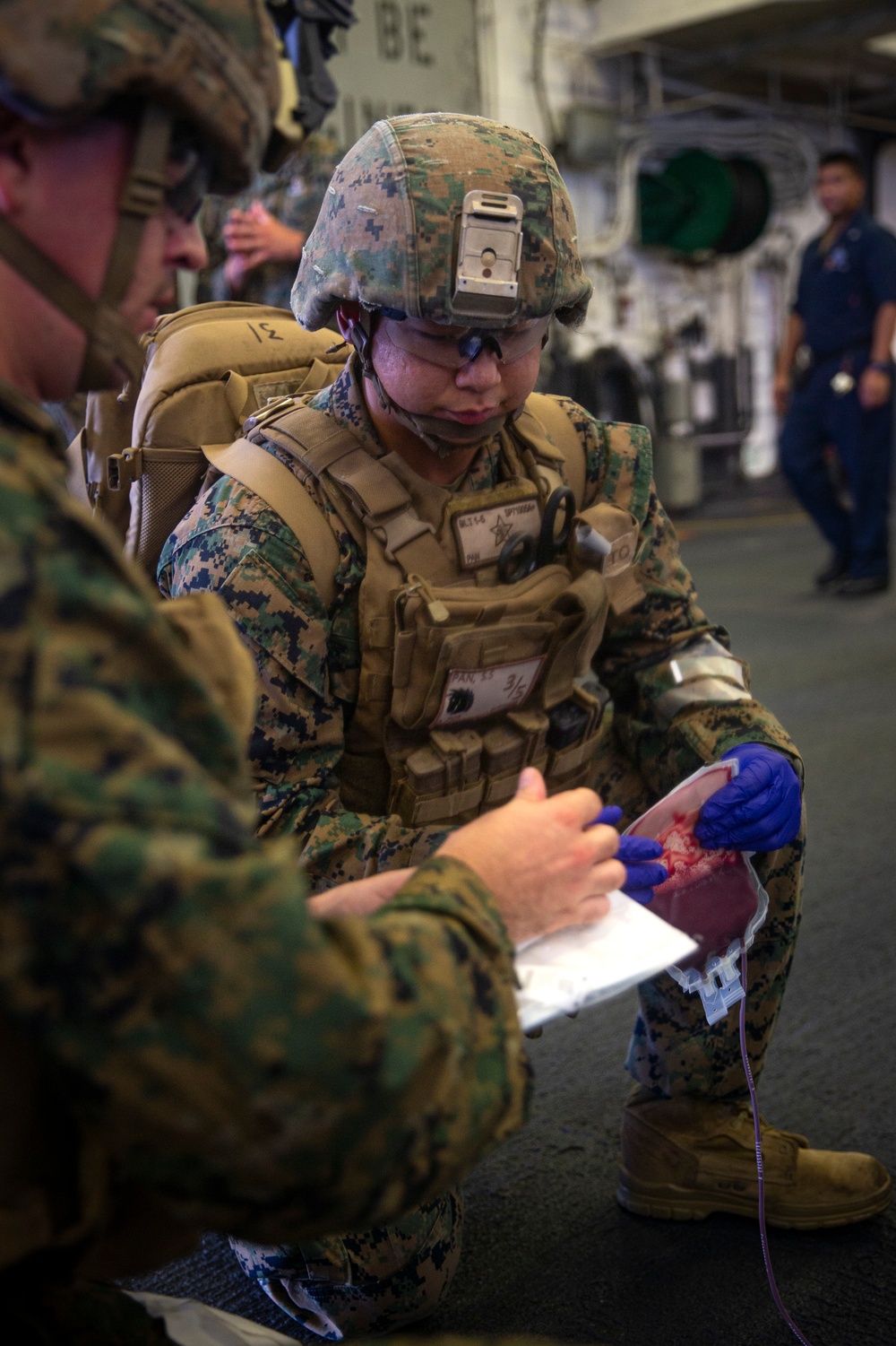 US Marines and Sailors conduct a live fresh old blood transfusion demonstration