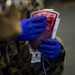 US Marines and Sailors conduct a live fresh old blood transfusion demonstration