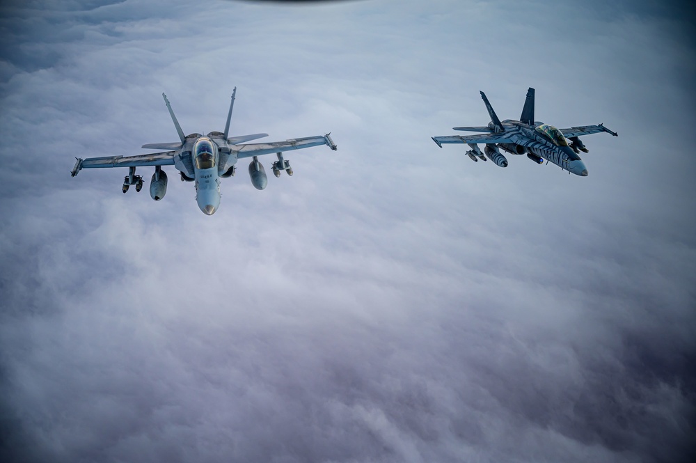 KC-135 Stratotanker Refuels F/A-18D Hornets