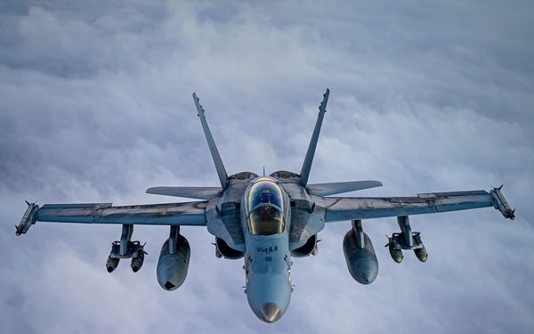 KC-135 Stratotanker Refuels F/A-18D Hornets
