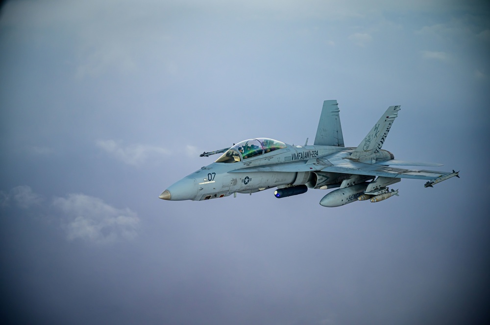 KC-135 Stratotanker Refuels F/A-18D Hornets
