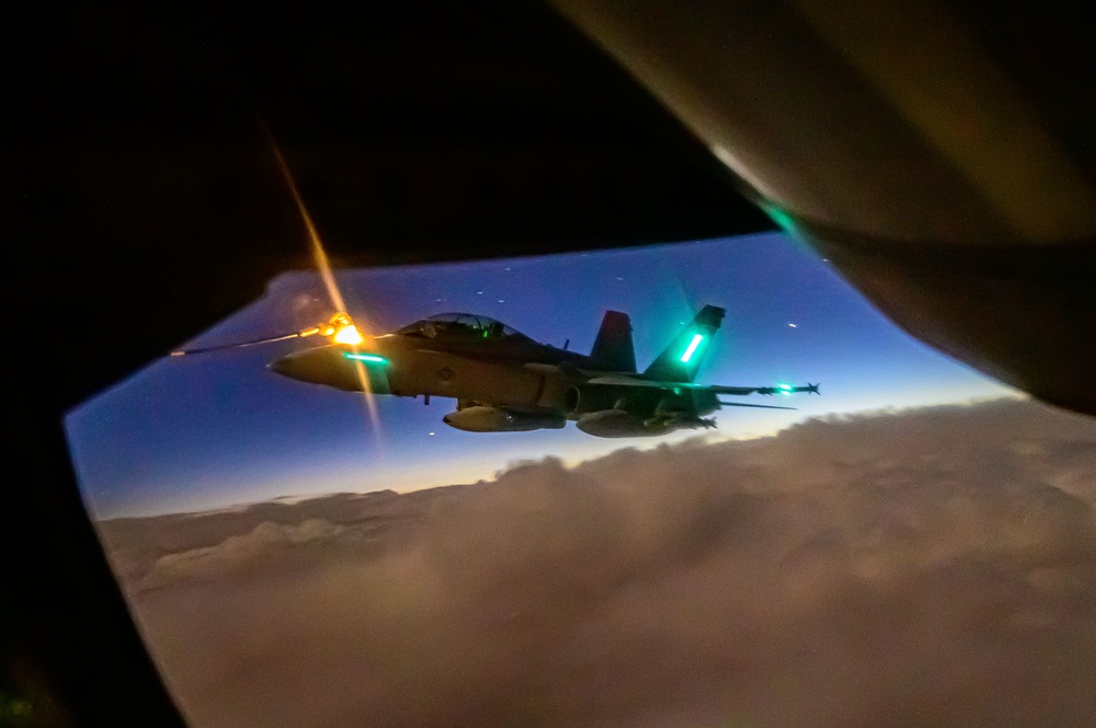 KC-135 Stratotanker Refuels F/A-18D Hornets