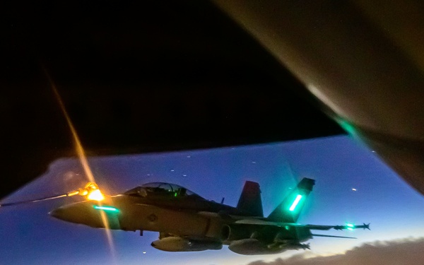 KC-135 Stratotanker Refuels F/A-18D Hornets