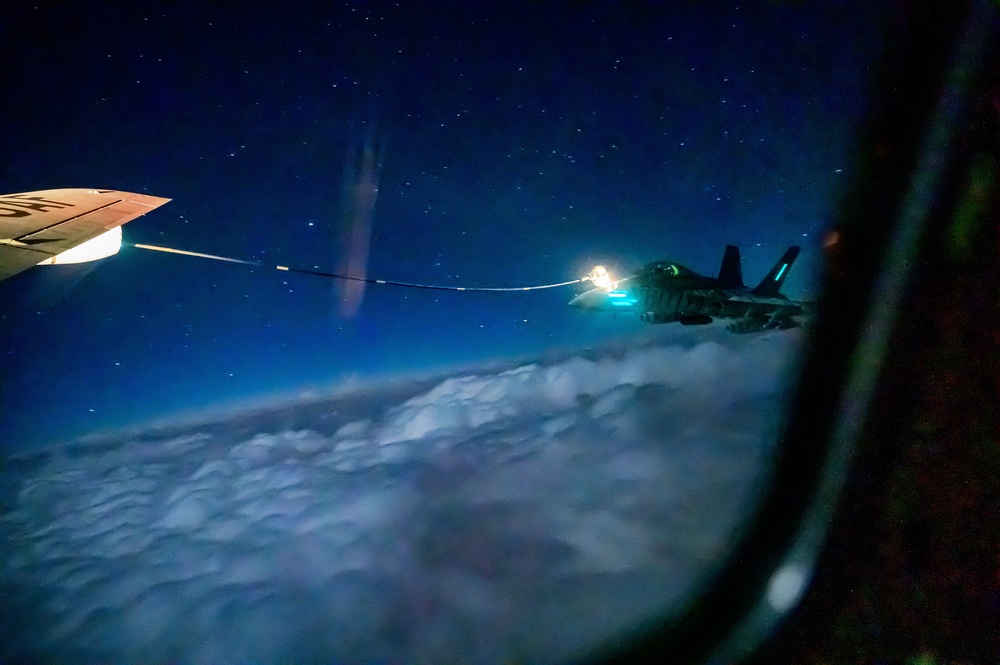 KC-135 Stratotanker Refuels F/A-18 Hornets