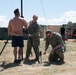 Sailors and Airmen assemble a ham radio HF antenna for Patriot 21