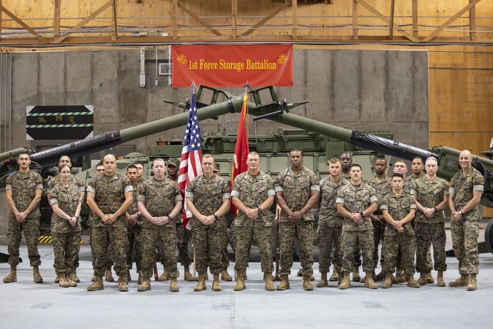 Marines Gathered for a Group Photo with Outgoing 1st Marine Force Storage Battalion Lieutenant Colonel