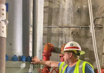 Contractors make high water dive to move bulkhead at Pine Creek Lake